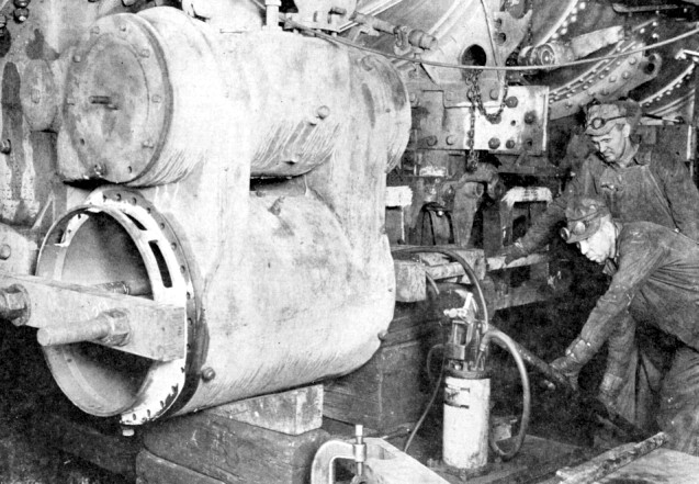 steam locomotive inserting piston bushing