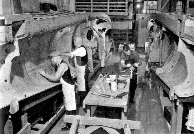 Crafting the wooden fuselage of a Mosquito aircraft in Canada