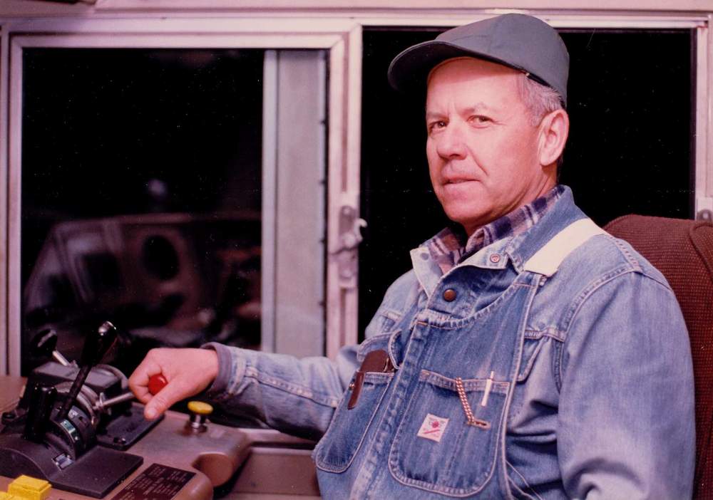 Rolly Martin, CPR locomotive engineer at
          work